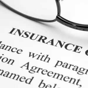 paper with insurance information written on it